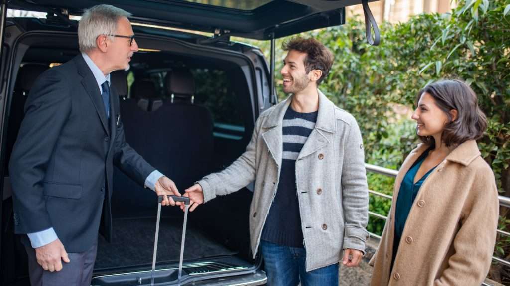Corporate chauffeur at Brisbane Airport for client pickup.