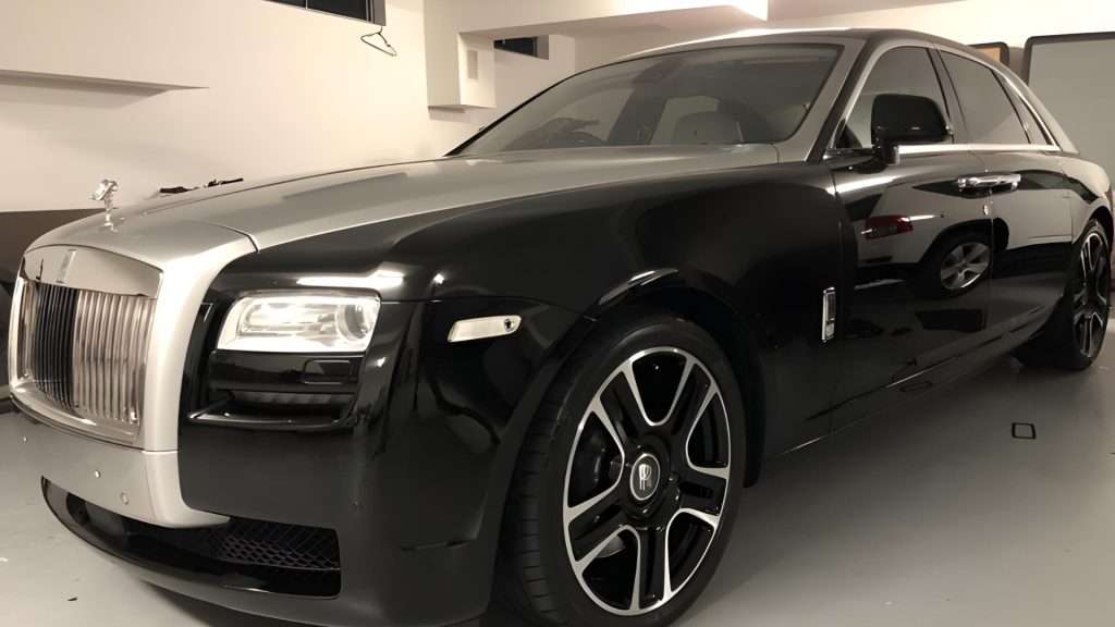 Rolls Royce Ghost luxury car on display.