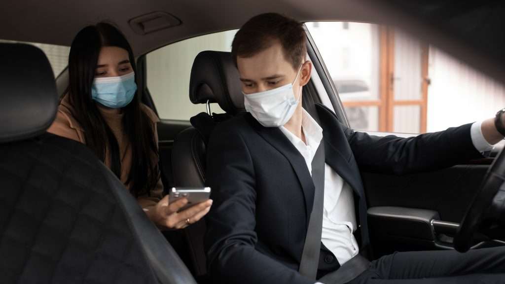 Chauffeurs with face masks
