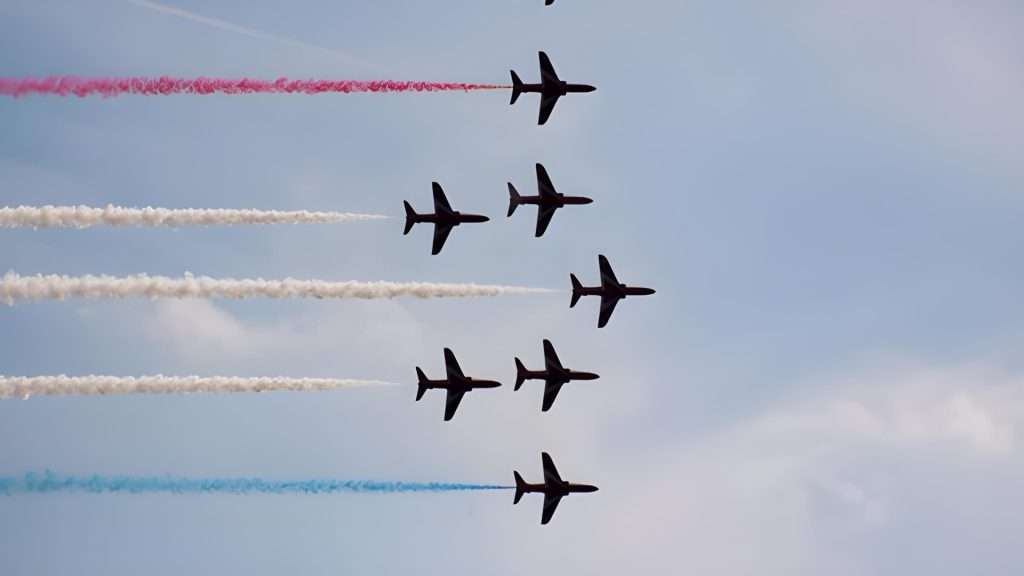 Pacific Airshow formation jets trailing coloured smoke