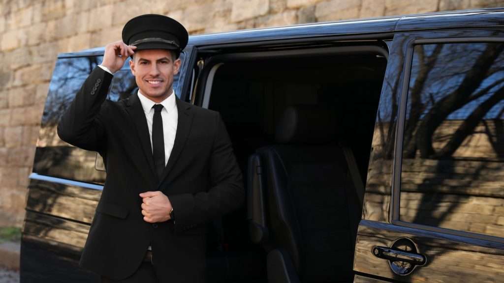 black luxury vehicle with a professional chauffeur