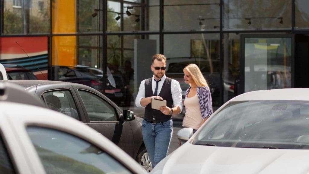 Couple walking to The Calile Hotel urban retreat