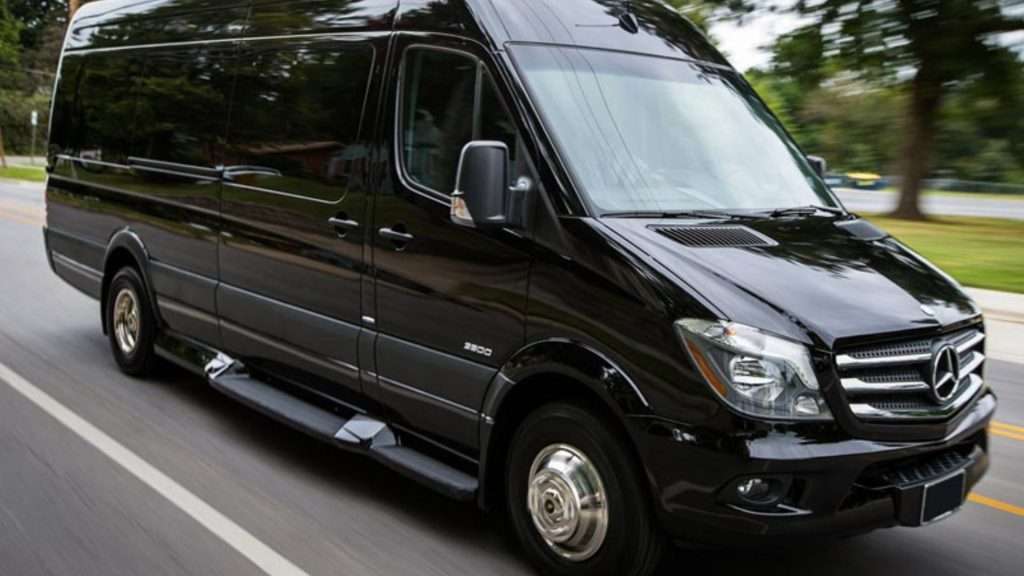 Airport Transfers Gold Coast black Mercedes van moving