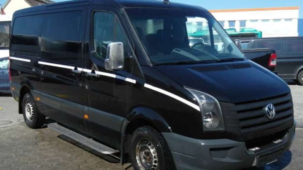 Airport Transfers Gold Coast black Volkswagen transport van