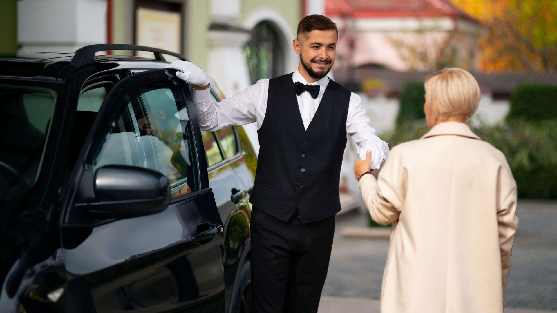 Chauffeur Service at Gold Coast driver assisting senior passenger.