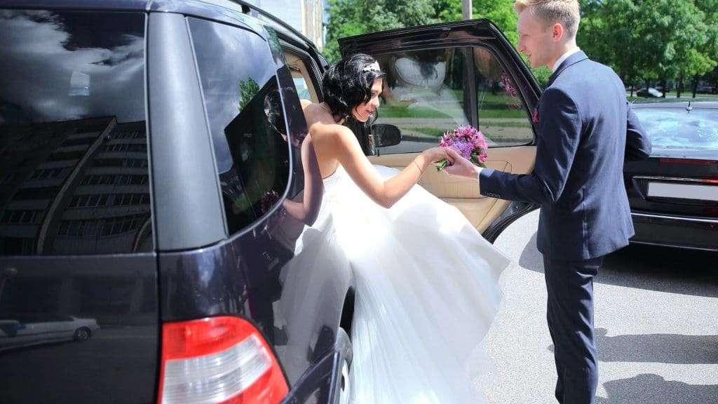 Luxury chauffeur hire for wedding arrival.