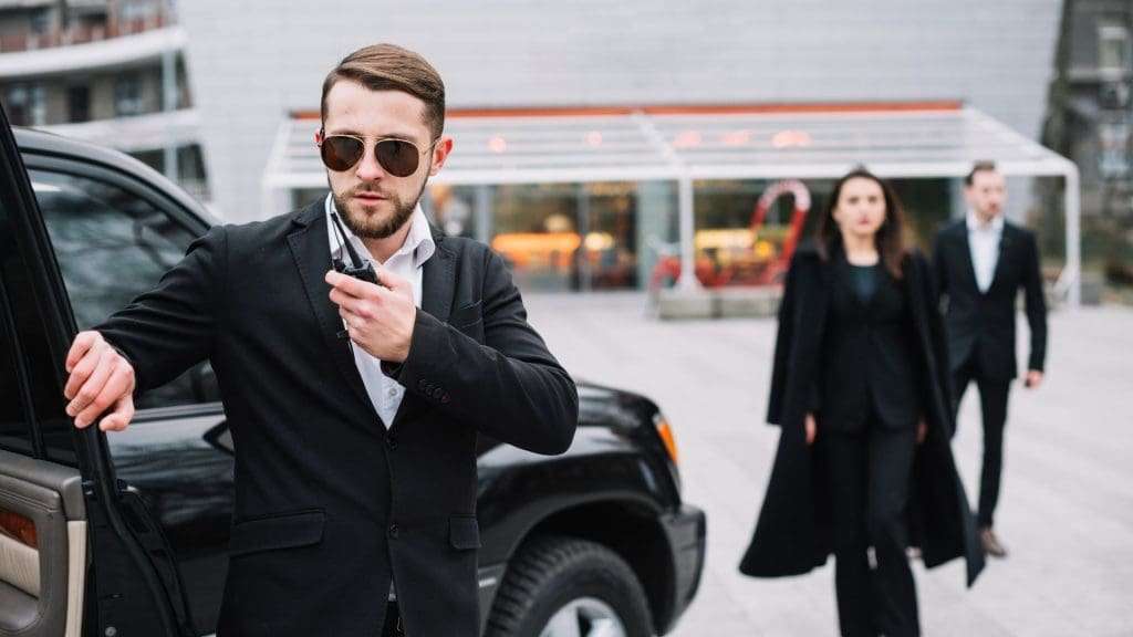 Luxury car hire chauffeur ensuring VIP client safety
