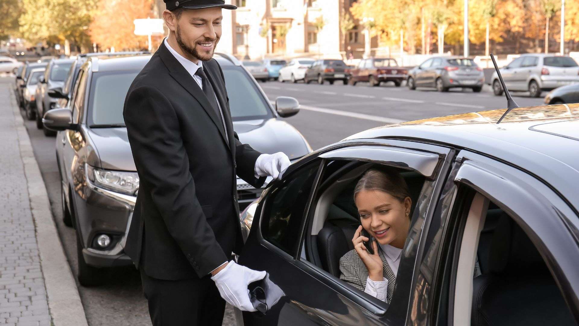 private chauffeur hire opening door for client